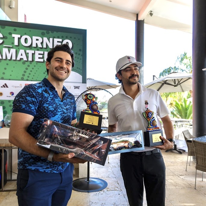 Tournament winners holding trophies and prizes at Chanks Golf